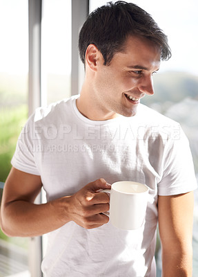 Buy stock photo Man, mug and smile with coffee by window in bedroom, apartment and hotel room for morning time, waking up and new day. Male person, adult and happiness for tea, espresso and cappuccino in Spain
