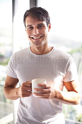 Buy stock photo Portrait, man and smile with coffee by window in bedroom, apartment and hotel room for morning time, waking up and new day. Male person, adult and happiness for tea, espresso and cappuccino 