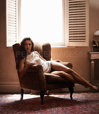 Buy stock photo Woman, sexy and thinking in chair at home, relax and underwear for elegant calm female person. Confident, feminine or sensual comfort, fashion and lady by window in lounge with natural light
