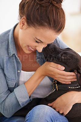 Buy stock photo Dog, woman and smile for animal, pet and cuddle together indoor for bonding, affection and friendship. Puppy, lady or owner for laugh, love and scratch and kiss for adorable, cute and companion
