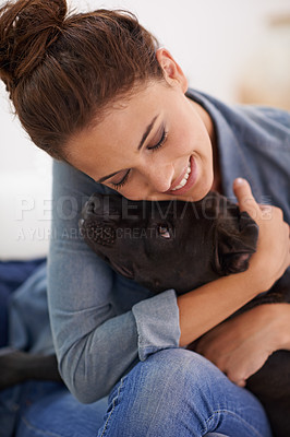 Buy stock photo Dog, woman and hug with smile for animal, pet and together indoor for bonding, affection and friendship. Puppy, lady or owner for laugh and home with love and scratch for adorable, cute and companion