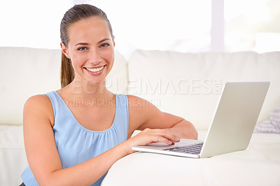 Buy stock photo Woman, portrait and laptop on couch, living room and smile for remote work, research and student. Female person, happy and tech for elearning, sofa and lounge for confidence and computer online