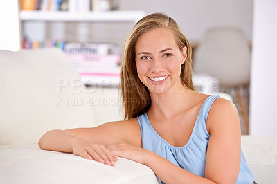 Buy stock photo Woman, portrait and confident on sofa, living room and smile for relaxation, peace and wellness. Female person, happy and home for beauty, couch and lounge for confidence and casual fashion style