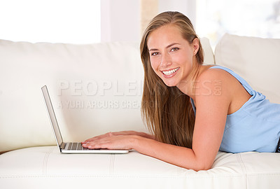 Buy stock photo Woman, portrait and laptop on couch, living room and smile for remote work, research and student. Female person, happy and tech for elearning, sofa and lounge for confidence and computer online