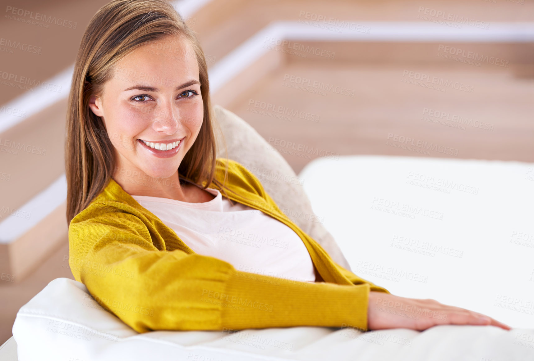 Buy stock photo Apartment, couch and happy woman relax in portrait in living room of home on holiday or vacation. Girl, smile and lounge on comfortable sofa in new house with pride, confidence and enjoying break