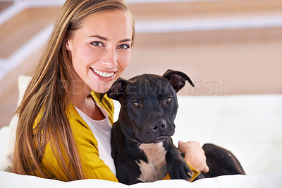 Buy stock photo Woman, dog and relax on sofa in portrait, smile for pet love and bonding at home with domestic canine. Happy, positive and trust with foster or adoption, cuddle puppy in living room and animal care