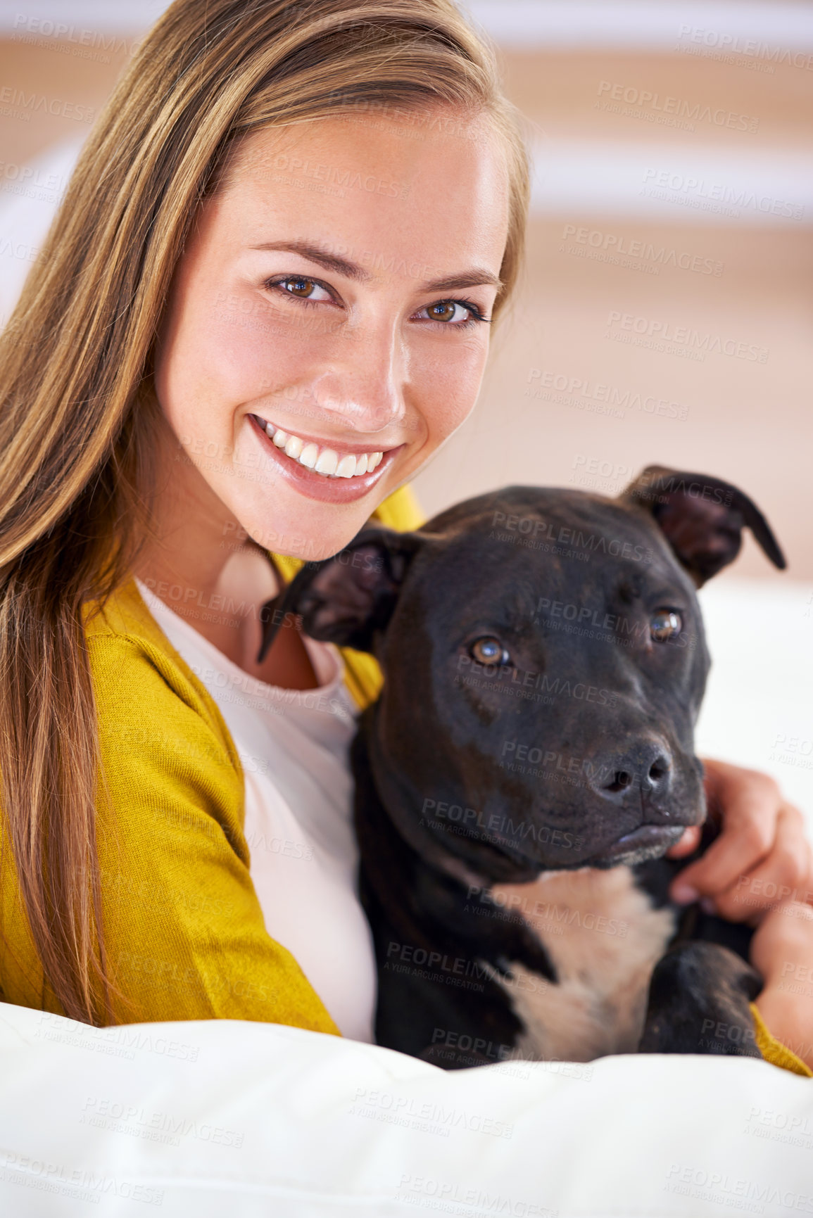 Buy stock photo Woman, dog and happy in living room in portrait, smile for pet love and bonding at home with domestic canine. Relax, positive and trust with foster or adoption, pitbull puppy and animal care on couch