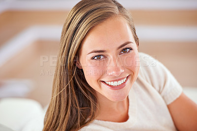 Buy stock photo Portrait of an attractive young woman resting her head on her hands