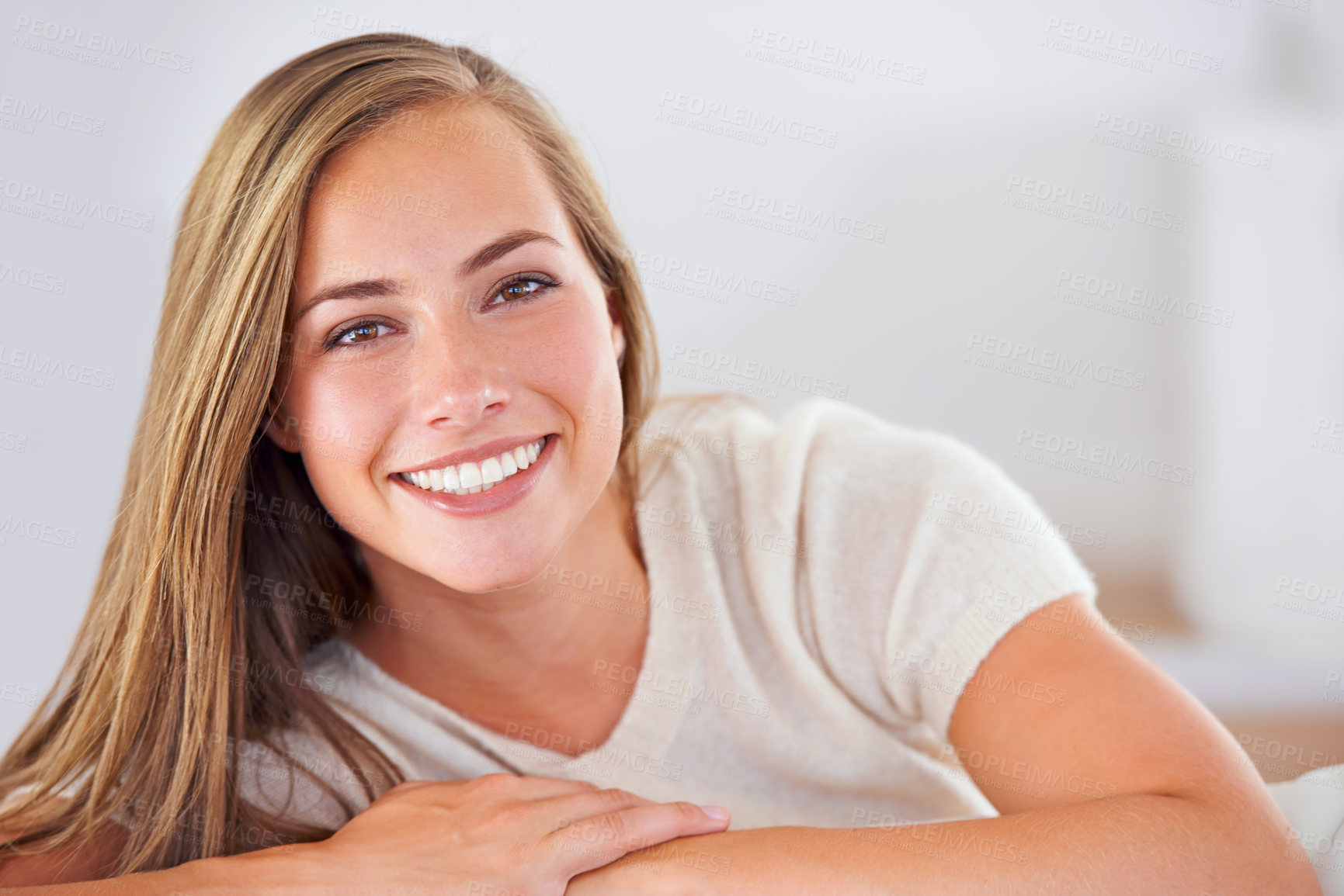 Buy stock photo Portrait of an attractive young woman relaxing at home