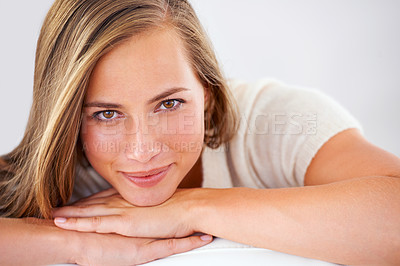 Buy stock photo Woman, portrait and closeup with smile on sofa for weekend break, relax and free time in living room. Happiness, comfort and face of female person on couch for peace, calm and rest in apartment.