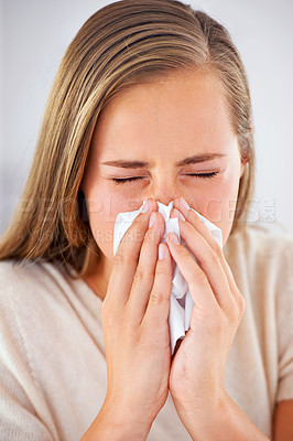 Buy stock photo Woman, sneeze and sick with flu or allergies and blowing nose in tissue for healthcare and healing in home. Medical, burnout and care for virus infection or person with sinusitis in apartment