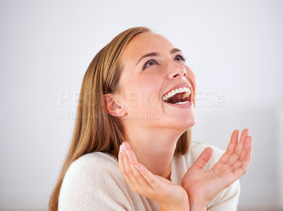 Buy stock photo Laughing, woman and happiness in studio with funny, comedy or reaction to humor in white background. Crazy, joke and girl giggle with joy from thinking of moment in comic or person with a smile