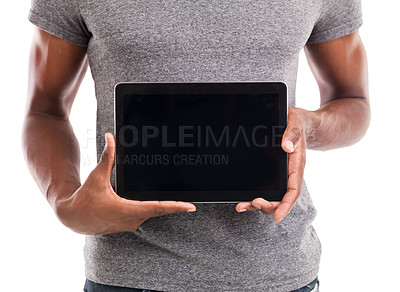 Buy stock photo Cropped shot of a man holding his digital tablet