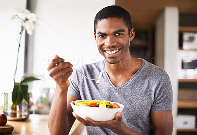 Buy stock photo Man, fruit salad and plate in portrait for eating, detox or happy in home kitchen for breakfast. African person, smile and pride for food, nutrition or vegan diet for health, wellness or meal in bowl