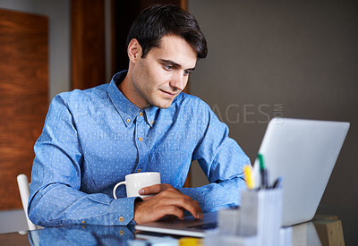 Buy stock photo Typing, laptop and business man at desk with coffee working on online project, proposal and research. Corporate office, professional and worker on computer for email, website search and internet