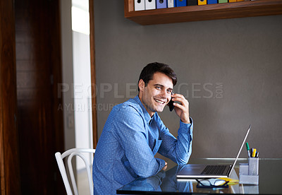 Buy stock photo Man, talking and cellphone with laptop in office at desk for communication, working and career for job. Businessman, entrepreneur and smile with tech, internet and stationery for discussion on call 
