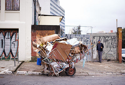 Buy stock photo Garbage, cart and trash in street outdoor for waste management, recycling and man cleaning in neighborhood. Community, scrap and boxes of junk material in sao paulo with person collecting old litter