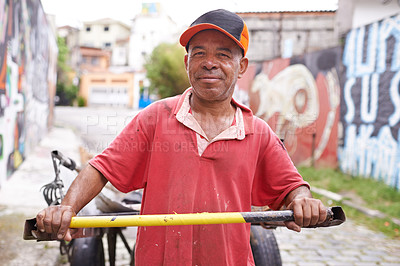 Buy stock photo Man, portrait and cart for garbage in street for smile, walk and collect trash for recycling for ecology. Person, rickshaw or barrow for sustainability, environment and nature on road in Sao Paulo