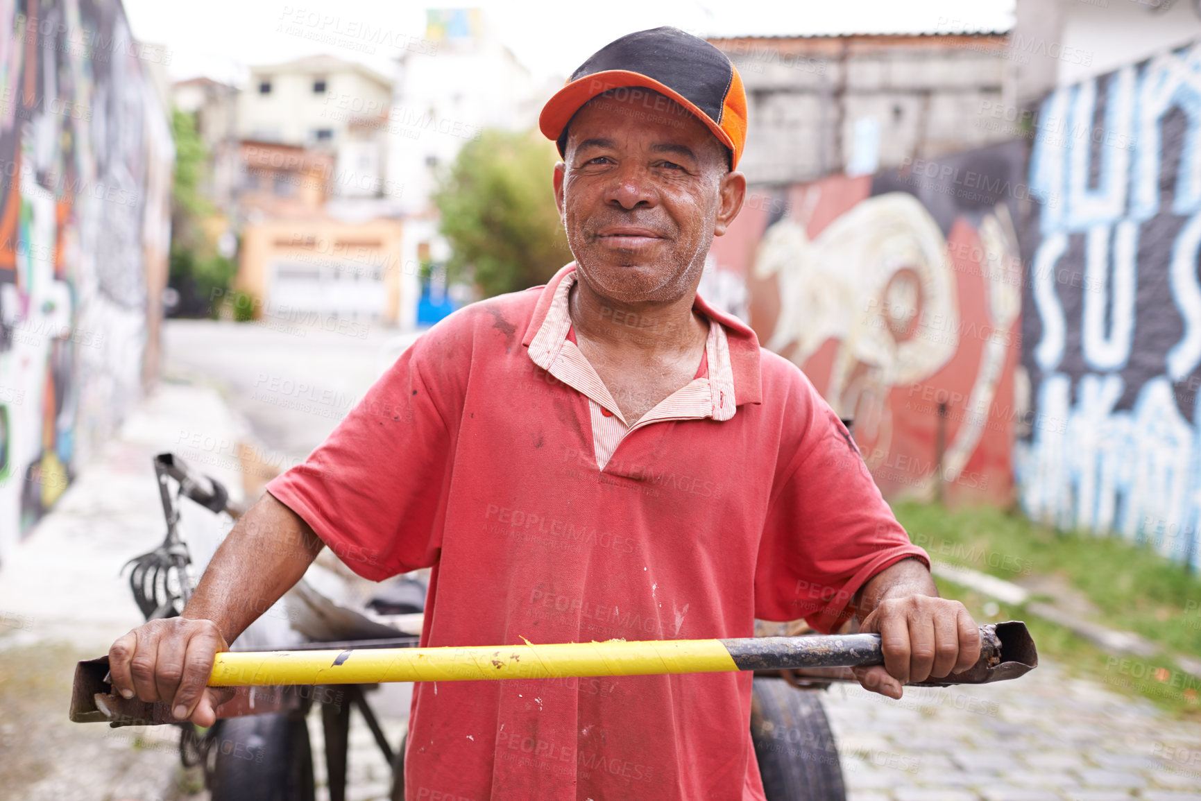 Buy stock photo Man, portrait and cart for garbage in street for smile, walk and collect trash for recycling for ecology. Person, rickshaw or barrow for sustainability, environment and nature on road in Sao Paulo