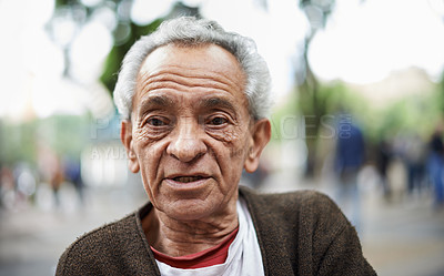 Buy stock photo Face, senior man and serious in outdoor for travel, retired and confident in street of Mexico. Portrait, male person and wellness to relax with wellbeing for healthy mind, positivity and leisure 
