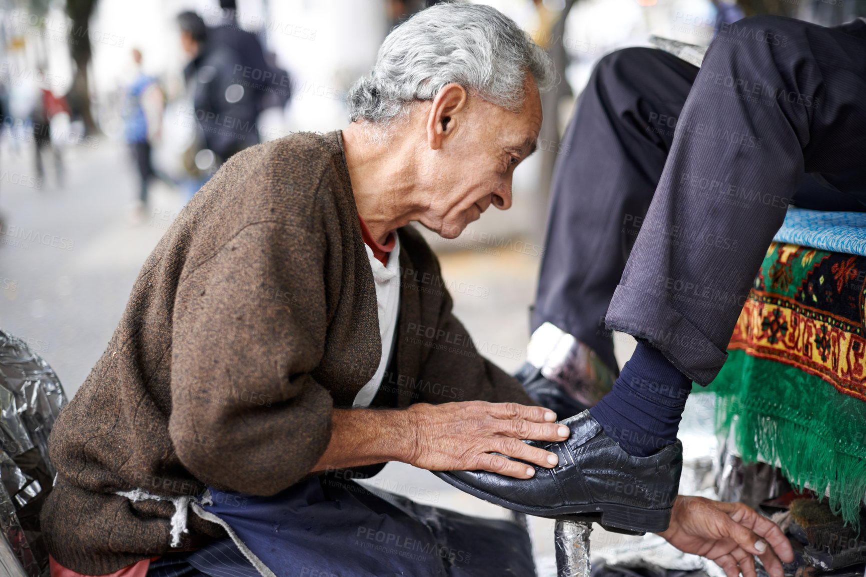 Buy stock photo Shine, shoes or old man in street, city or cleaning service for client or customer with polish or trade. Cloth, senior or feet of businessman in downtown Sao Paulo for footwear, job or outdoor help