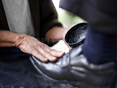 Buy stock photo Hands, repairman and polishing with leather shoes for customer in handcraft, startup business and store. Entrepreneur, shoemaker and service with client for footwear, skills and professional.