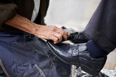 Buy stock photo Hands, repairman and polishing shoes for customer in handcraft, startup business and store. Entrepreneur, shoemaker and service with client for leather footwear, skills and professional in street