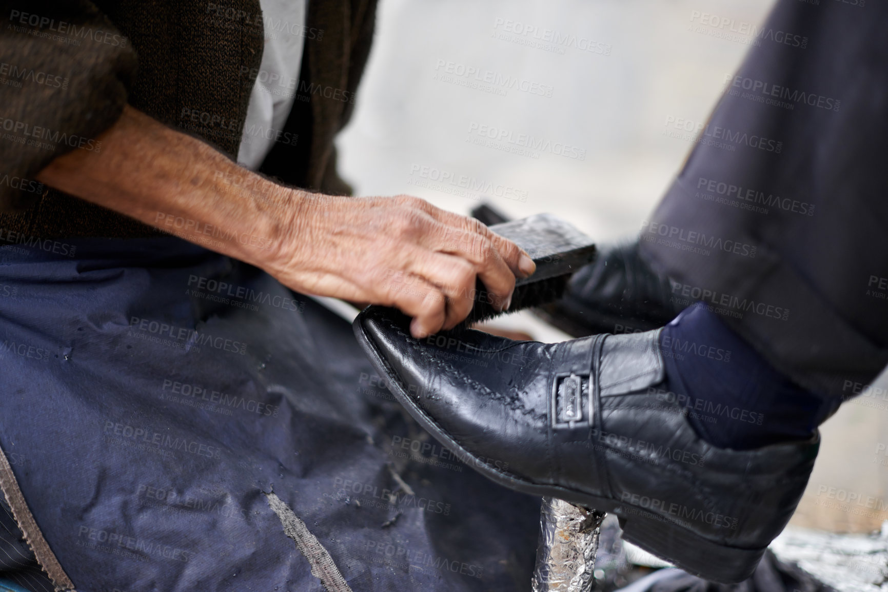 Buy stock photo Hands, repairman and polishing shoes for customer in handcraft, startup business and store. Entrepreneur, shoemaker and service with client for leather footwear, skills and professional in street