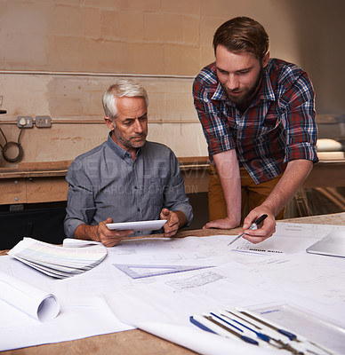 Buy stock photo Architecture men, planning and blueprint with tablet for discussion, construction or vision in workshop. Senior man, young male partner and talking with paperwork, property or real estate development