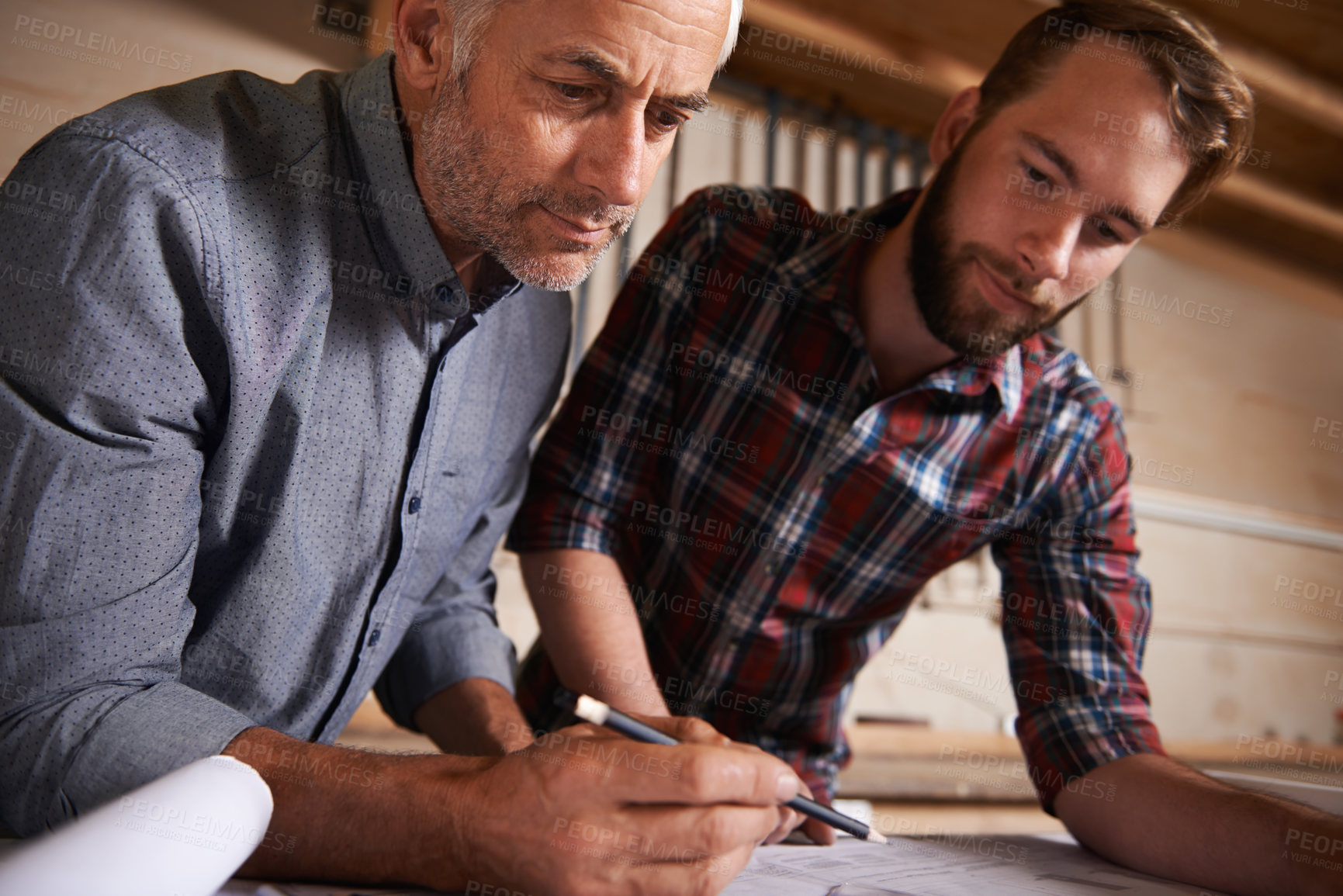 Buy stock photo Teamwork, father and son in workshop, architect and pencil with drawing, documents and wood. Parent, men and renovation with construction and building with planning for project, startup and carpenter