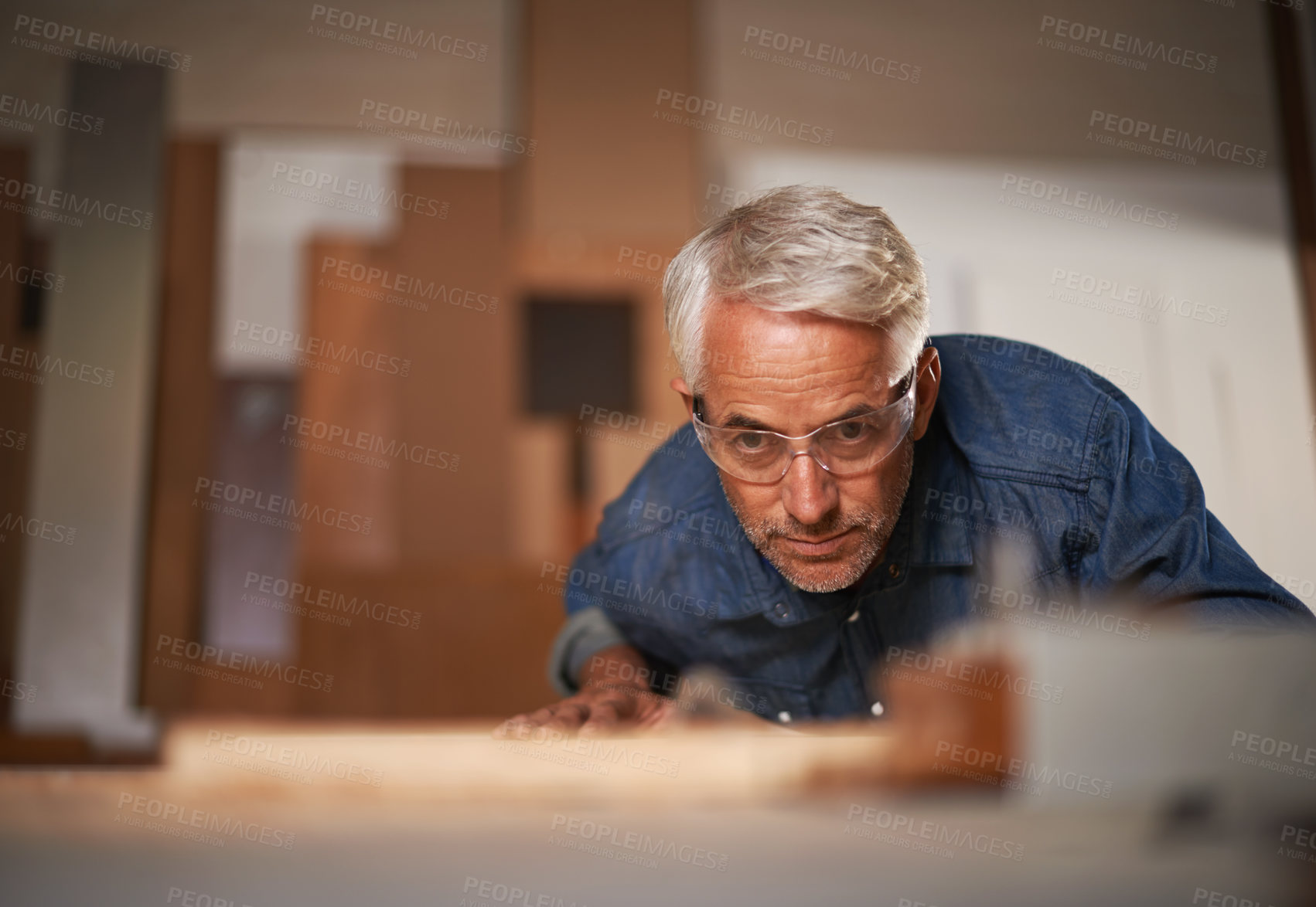 Buy stock photo Carpenter, thinking and planning in workshop, safety and glasses in small business. Design, woodwork or production with lumber or timber, contractor and materials or tools for furniture building 