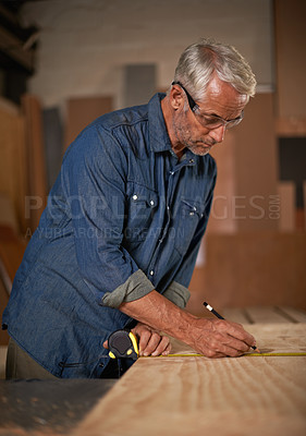 Buy stock photo Carpentry, measuring tape and man with pencil, wood and designer furniture manufacturing workshop. Creativity, small business and professional carpenter working on sustainable wooden project design.