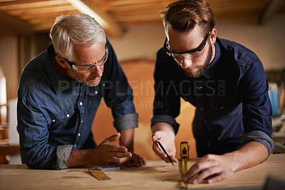 Buy stock photo Carpentry, men and measurement in workshop teaching and learning furniture design, manufacturing or internship. Mentorship, carpenter or apprentice at sustainable wood business or teamwork on project