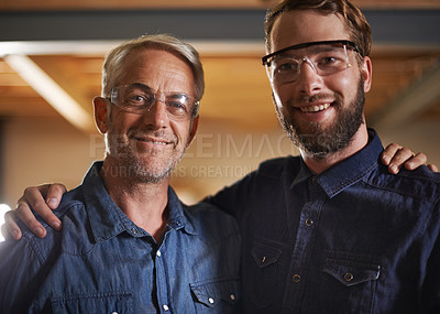 Buy stock photo Man, hug and smile with portrait, workshop and family business or apprenticeship. Mature father, son and embrace with artisan, carpentry and together for startup and mentor or learning with happiness