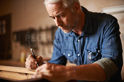 Buy stock photo Carpentry, furniture manufacturing and man with pencil, focus and wood design workshop at small business. Creativity, thinking and professional, senior carpenter working on wooden designer project.