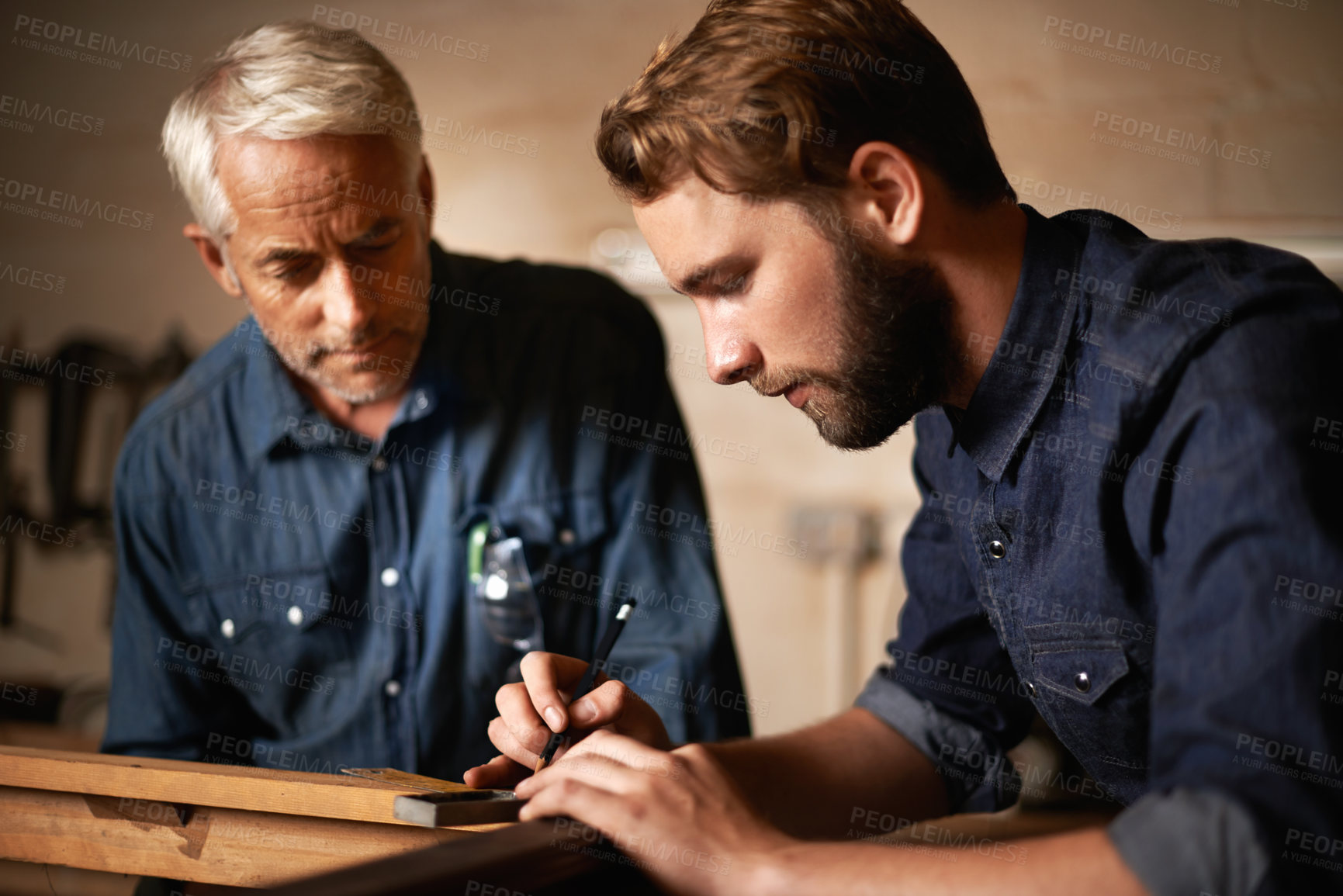 Buy stock photo Man, dad and coach with wood, workshop and family business or apprenticeship. Father, adult son and design with artisan, carpentry and together for startup or mentor with learning and working