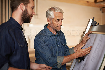Buy stock photo Engineer, team and men with blueprint for planning project, construction and discussion. Architecture, apprentice and mentor with design, drawing and senior father with son for training at workshop