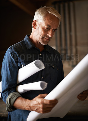 Buy stock photo Senior architect check blueprint, man with renovation or remodeling project and review floor plan design. Architecture industry, engineer and male professional designer with analysis and mission