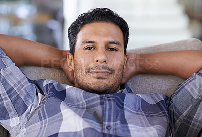 Buy stock photo Man, portrait and sofa to relax in home, smile and satisfaction with lying on weekend. Happy male person, lounge and calm or comfortable in apartment, closeup and confident for peace and living room