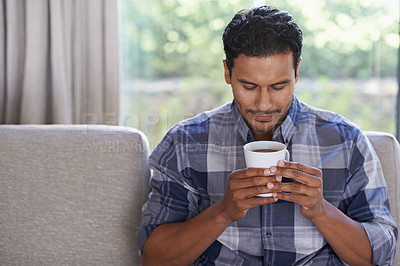 Buy stock photo Man, couch and relax with coffee for morning, routine or solitude, comfort and calm for peace. Male person, warm beverage and aroma for satisfaction or happiness with contentment and ease in lounge.