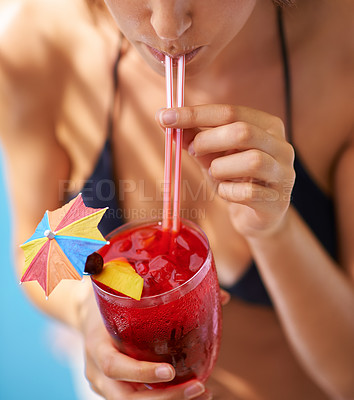 Buy stock photo Vacation, hand and woman drinking cocktail in bikini for travel, weekend break and summer party in Fort Lauderdale. Person, glass and alcohol in swimwear for relax, peace and rest at holiday resort
