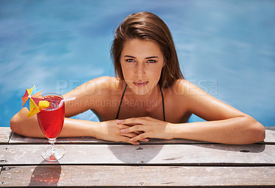 Buy stock photo Woman, portrait and relax with cocktail in swimming pool with bikini for leisure, luxury and resort or villa. Girl, summer and tropical vacation or holiday in Maldives with beverage for sunbathing.