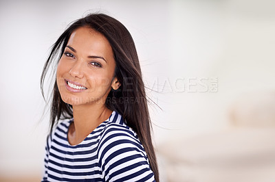 Buy stock photo Woman, portrait and happy in home on weekend, smile and satisfaction in living room for enjoyment. Female person, breeze and confident on mockup space, cheerful and wellness by peace or calm mindset
