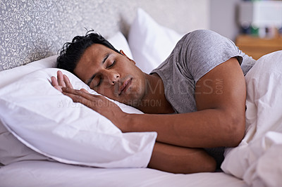 Buy stock photo Man, care and sleeping in bed in morning, tired and peace rest on soft pillow with comfortable mattress. Healthy person, dream or relax in modern bedroom, lazy weekend or fatigue or wellness in home