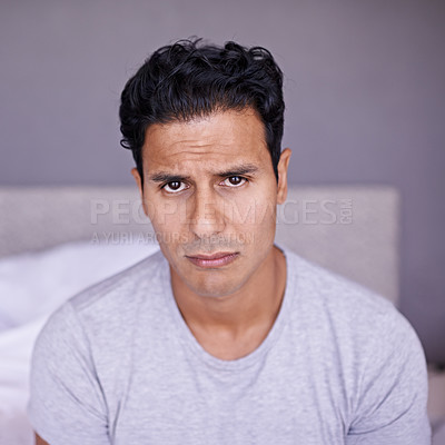 Buy stock photo Man, sad and frustrated in bedroom in portrait, disappointment and upset with mental health in morning. Young person, unhappy face and problem on weekend with depression and grumpy on bed in house