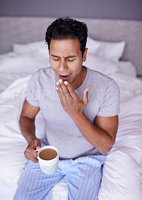 Buy stock photo A handsome male holding a hot beverage