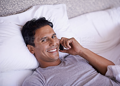 Buy stock photo Shot of a handsome young man trying to get some rest in bed