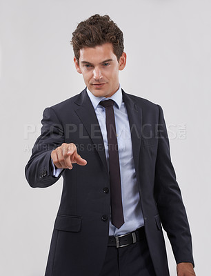 Buy stock photo Business, man and click a digital interface in studio on white background for company research and ideas. Corporate, male person and touchscreen for user experience with technology transformation.