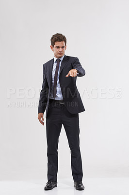 Buy stock photo Businessman, studio and pointing with interface for touch, UX or UI on a gray background. Full body of young man, user or employee with interaction for virtual technology, push or click on mockup