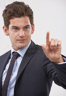 Buy stock photo Air, hand or businessman on touchscreen in studio on white background for metaverse access. Technology, interface and software system with finger pointing, doubt and employee in suit for networking